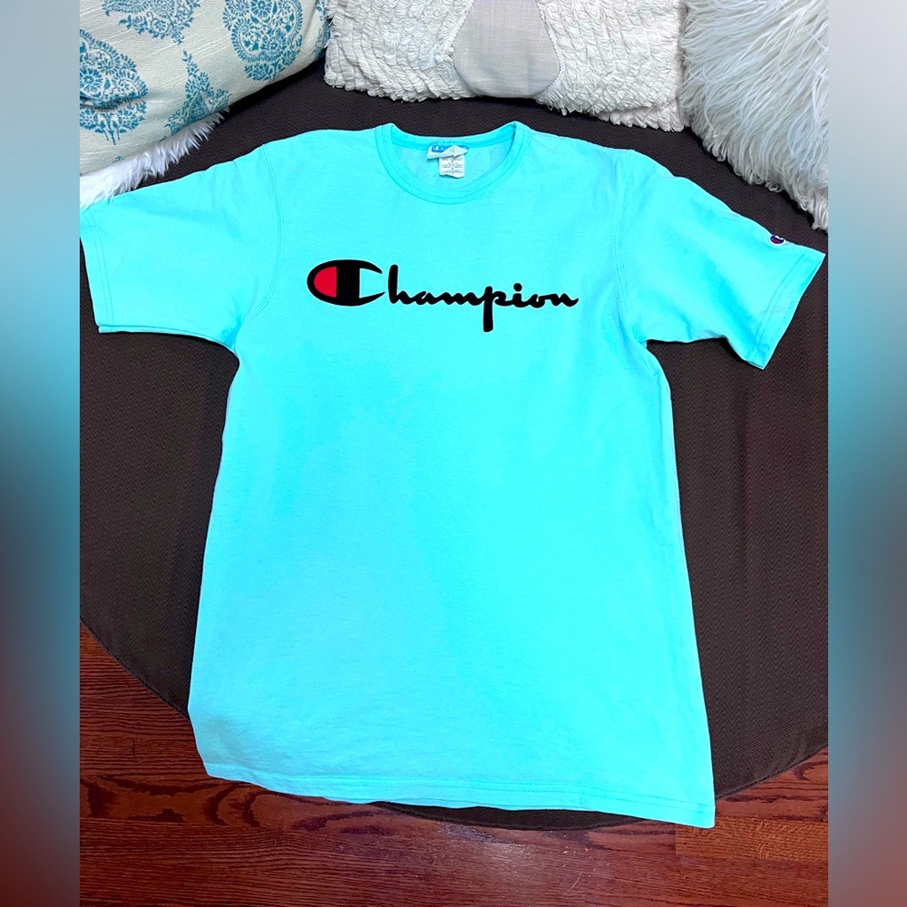 Champion mens tee with logo on the front and sleeve
